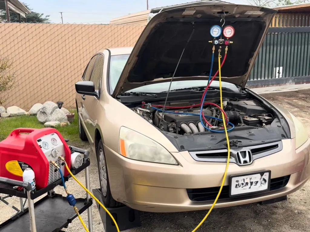 Complete Car AC Repair with refrigerant gauges and professional AC recharge equipment